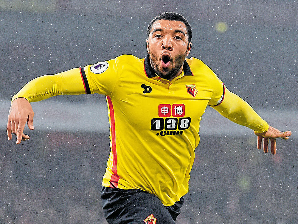 no stopping him: Watford's Troy Deeney celebrates after scoring against Arsenal. reuters