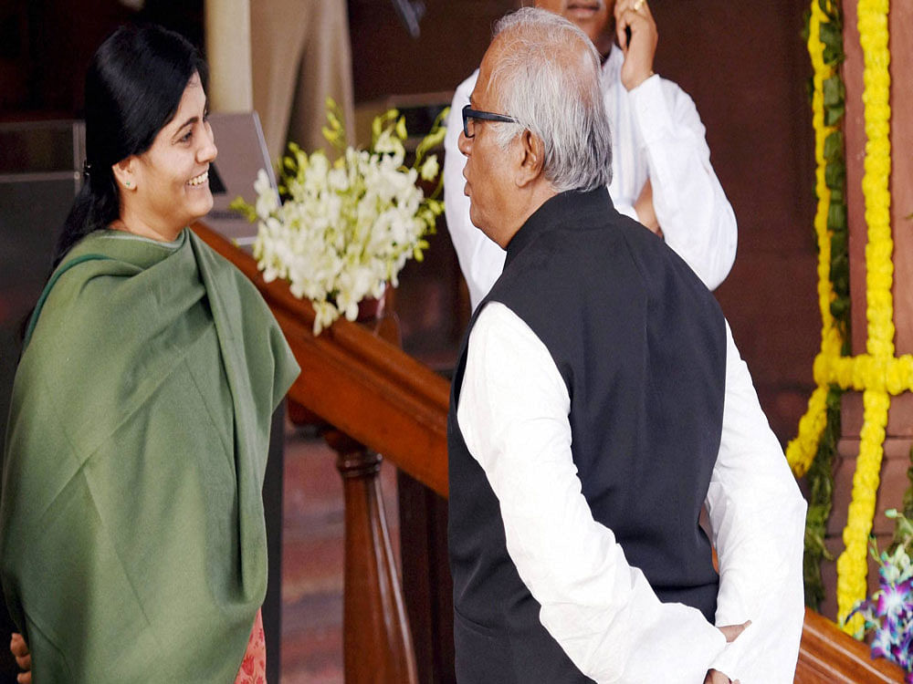 Union minister Anupriya Patel and TMC MP Saugata Roy at Parliament House on the first day of Budget session in New Delhi on Tuesday. PTI Photo