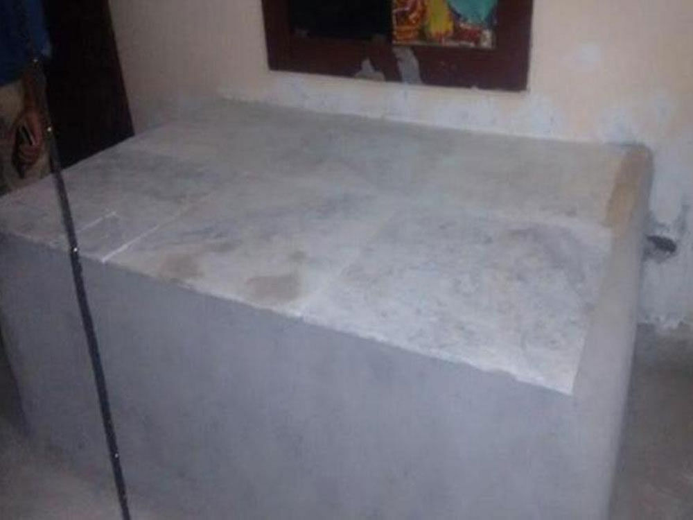 The accused allegedly strangled the woman, stuffed the body in an iron box, then put it in a larger box before constructing a marble platform over it to hide the crime. Screengrab