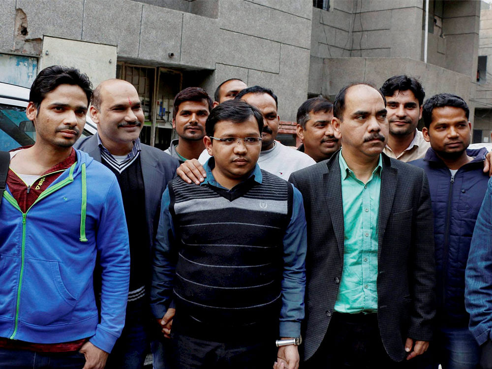 The two accused Anubhav Mittal and Sridhar Prasad, who were arrested by the Uttar Pradesh Special Task Force (STF) for an online trading scam worth over Rs. 3,700 crore in which around 6.5 lakh people were cheated, in Noida on Friday. PTI Photo