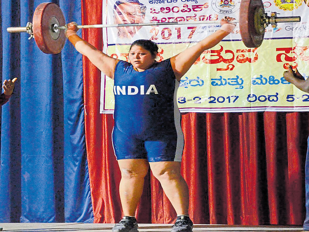 Powering through: Kanchan PM of SAI, Southern Centre lifted a total of 186 kg to clinch gold in the women's 75-plus category on Saturday. DH photo