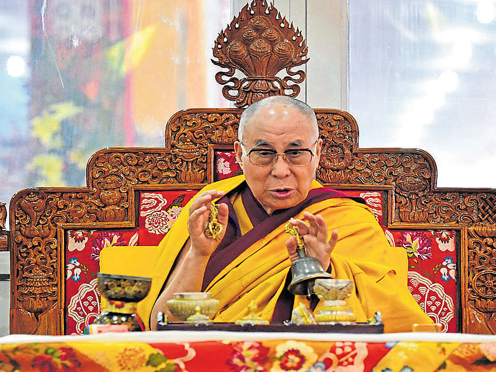 The Dalai Lama, Buddhist spiritual leader, addresses his followers at Bodh Gaya on the occasion of Kalchakra Puja. Mohan Prasad