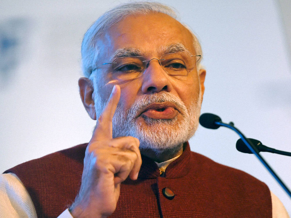 Modi remains the poll mascot of the BJP in four out of five poll-bound states of Uttar Pradesh, Uttarakhand, Goa and Manipur. PTI File Photo.