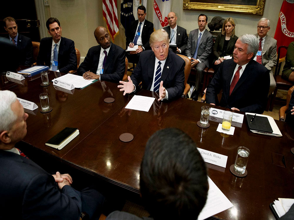 US President Donald Trump meets with leaders of the pharmaceutical industry in the Oval Office at the White House in Washington, DC, recently. AP/PTI