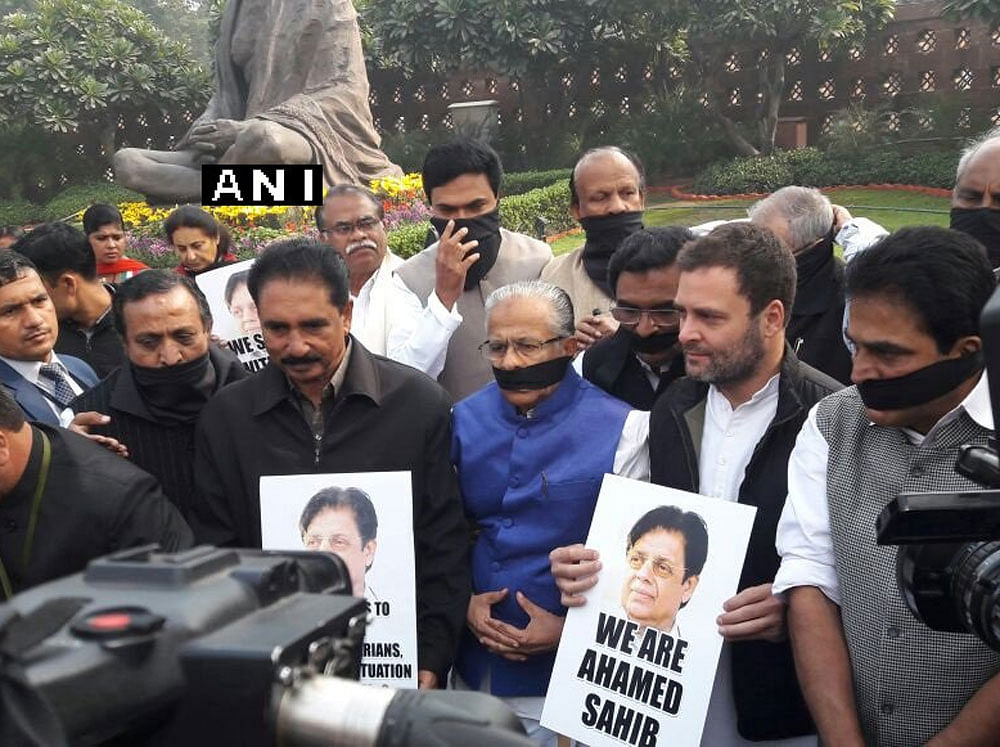 Opposition MPs including Rahul Gandhi and Mallikarjuna Kharge staged a protest inside parliament complex. ANI/Twitter