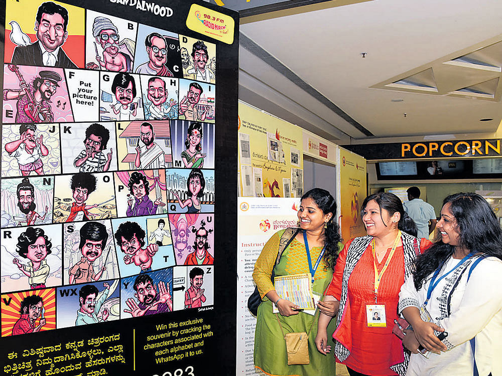 Participants take a look at a poster at Biffes on Monday. dh photo
