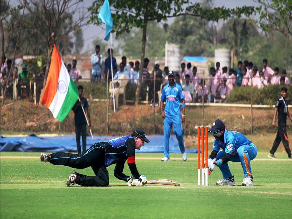 A New Zealand batsman completes a run during World Cup Blind Cricket T20 match against India in Bhubaneswar on Tuesday. PTI Photo