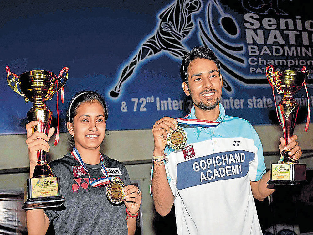 Triumphant: Sourabh Varma (left) and Rituparna Das won the men's and women's titles     respectively at the 81st National badminton championships in Patna on Tuesday. AP/PTI