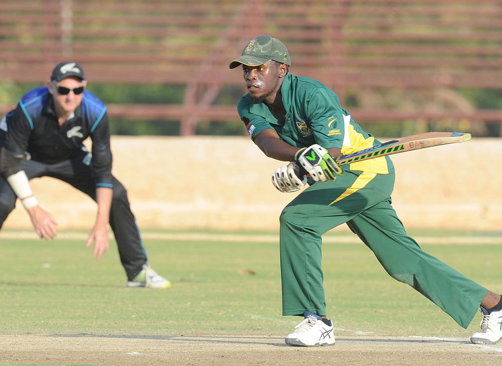 Blazing knock: South Africa's Buhle Bhidla en route to his century against New Zealand in Bengaluru. DH PHOTO