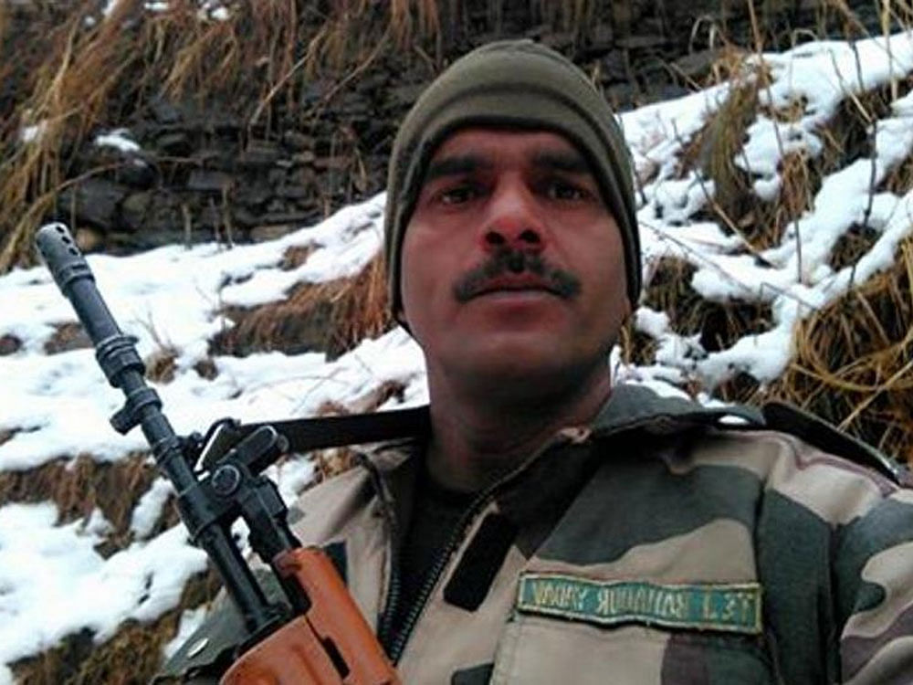 BSF jawan Tej Bahadur Yadav had on January 9 posted a video on Facebook which showed a meal box comprising a watery soup-like dal, which he said had only turmeric and salt and a burnt chapatti. Image courtesy Facebook.