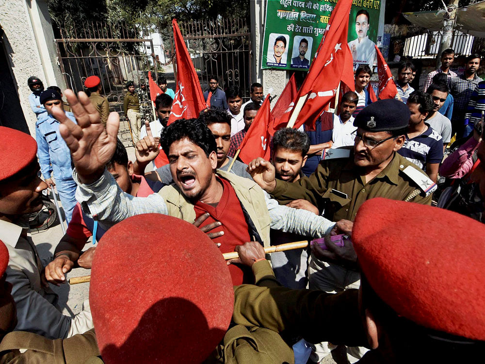 Police takes action against AISA protesters who protested against the leak of a question paper of Bihar Staff Selection Commission (BSSC), in Patna on Friday. PTI Photo