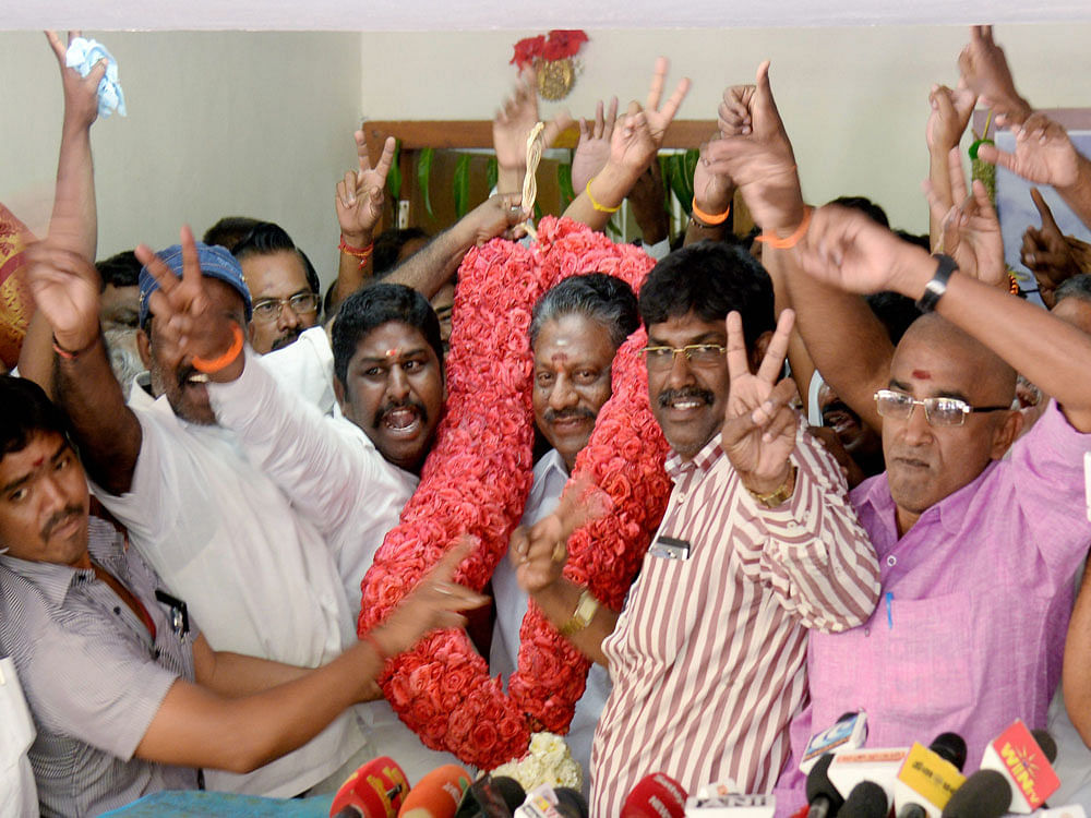 Tamil Nadu Chief Minister O Panneerselvam being greeted by his supporters at his residence in Chennai on Firday. PTI Photo