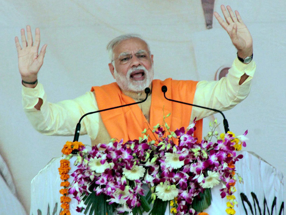 Modi, who has stepped up his attack on Akhilesh in recent days, also said that the Chief Minister is to be blamed if people of the state which he ruled for five years do not see 'achche din'. PTI Photo