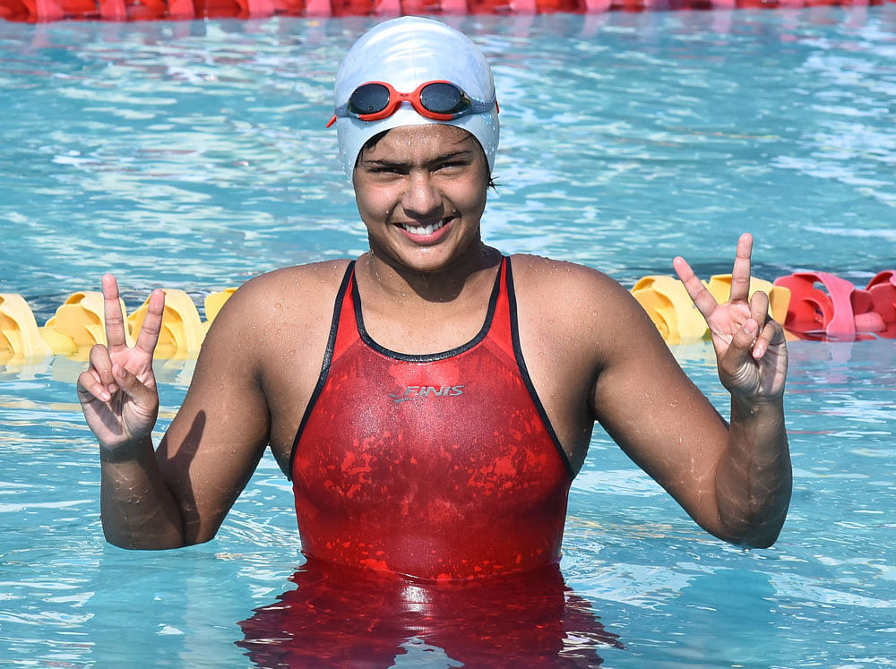 New talent on the block: Young swimmer Khushi Dinesh stole the show at the swimming competitions in the State Games, bagging as many as five gold medals. DH photo/ Tajuddin Azad