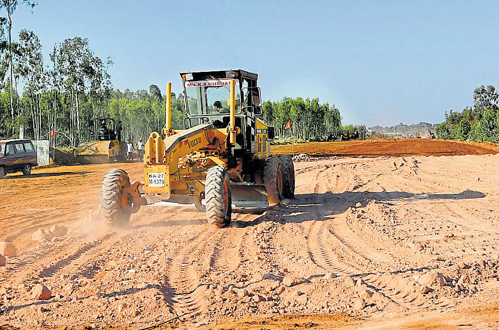 The alternative road to Kempegowda International Airport getting ready near the southwest entrance of the airport.