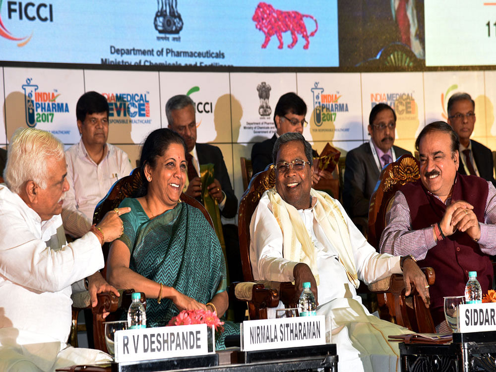 (From Left) Minister R V Deshpande, Union minister Nirmala Sitharaman, Chief Minister Siddaramaiah and Union minister Ananth Kumar at the inauguration of India Pharma and  India Medical Device 2017 exhibition in Bengaluru on Saturday. DH photo