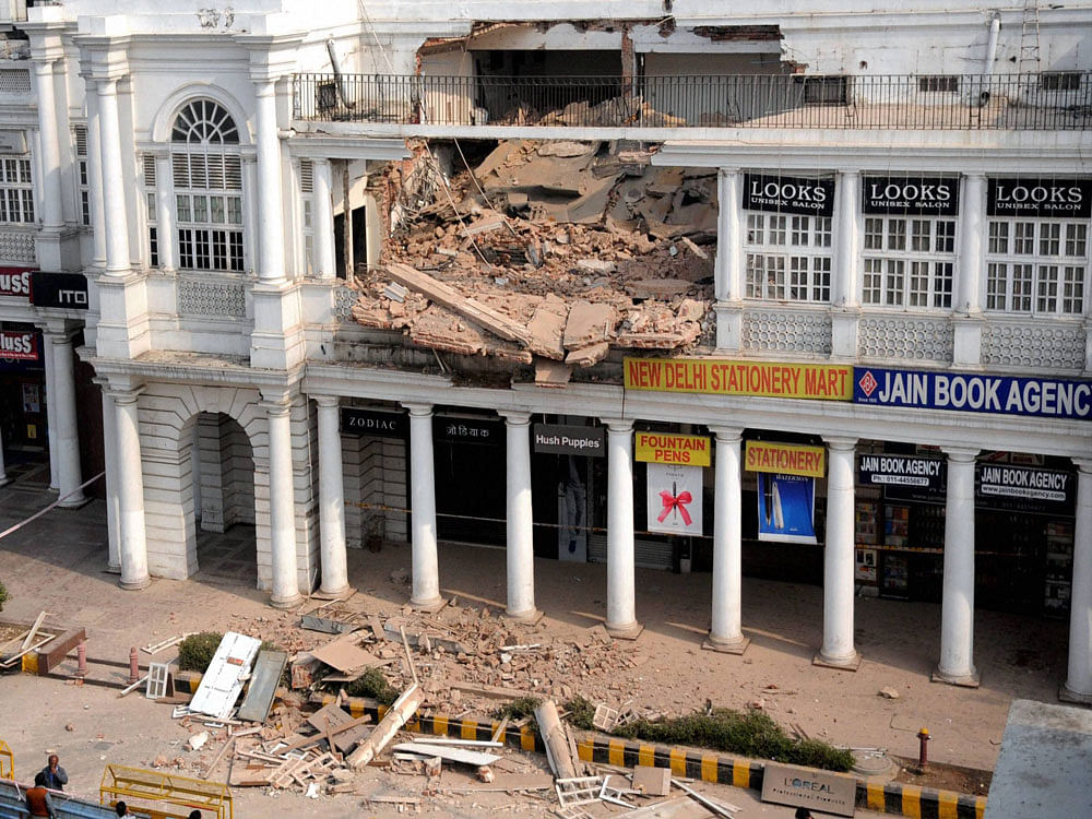 Preliminary probe suggests that excess load on the terrace could have led to the collapse. PTI