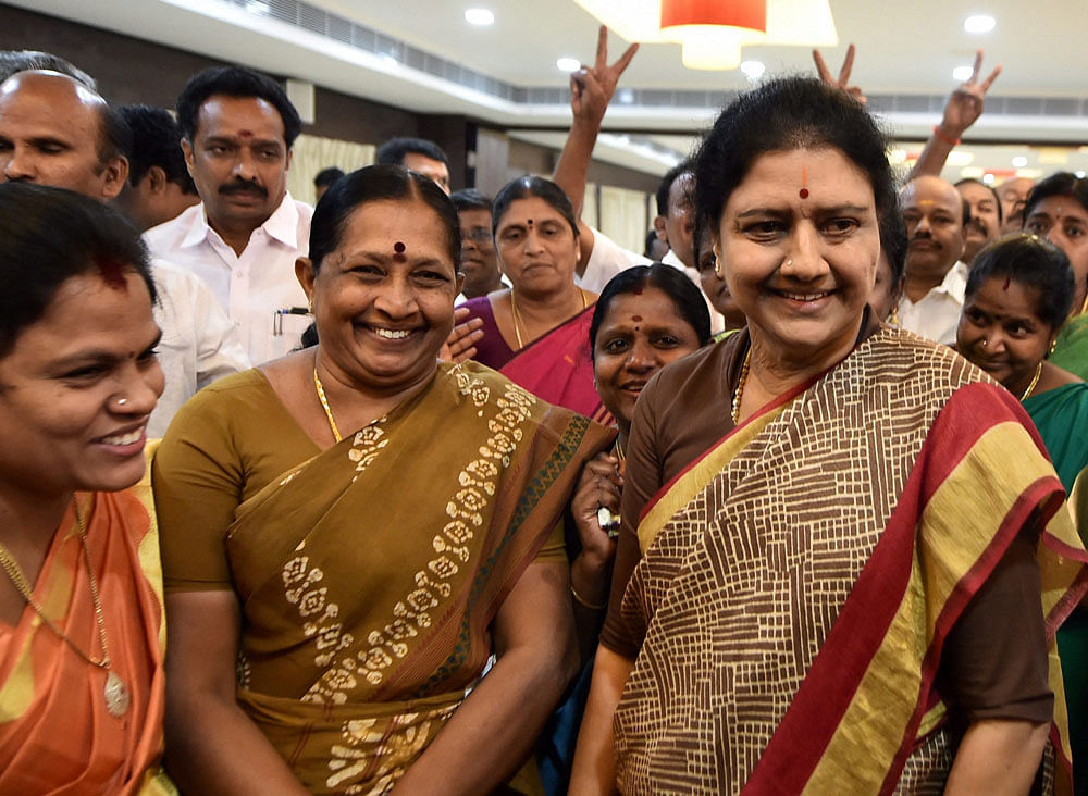 AIADMK General Secretary VK Sasikala interacting with party's MLAs supporting her after the press conference at the resort in Koovathur at East Coast Road where various AIADMK MLAs are camping to decide on the further course of action in forming new government, outskirts of Chennai on Sunday. PTI Photo