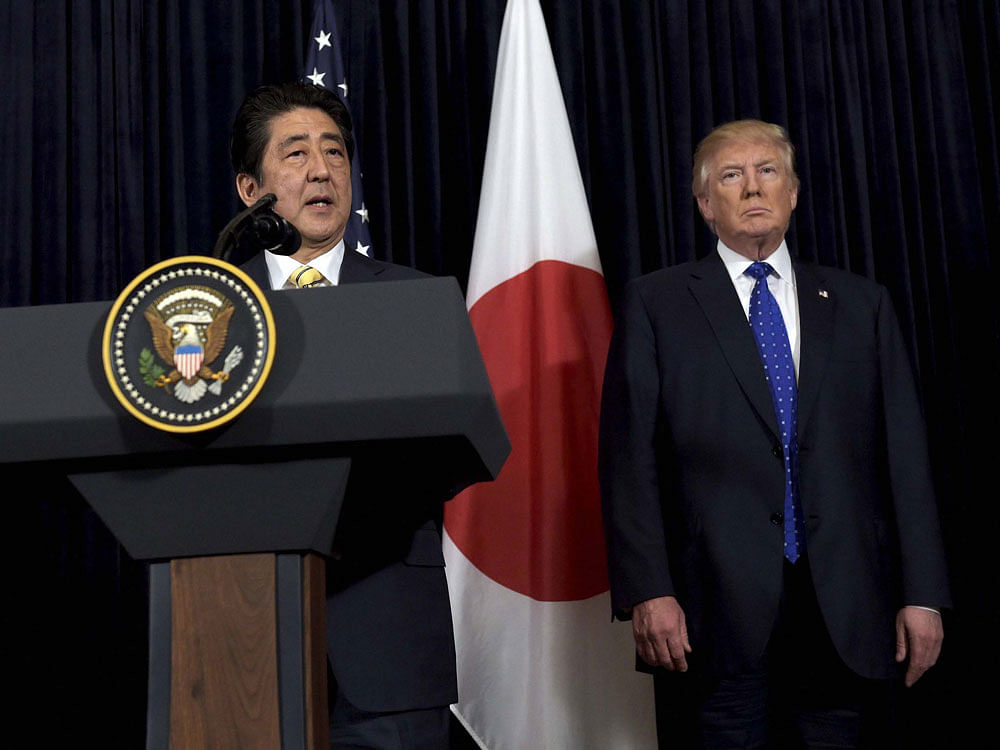 During the current visit of Abe to Washington, President Trump agreed to further strengthen security ties and confirmed that US forces will continue to be committed to defending the Senkaku Islands in Okinawa Prefecture, Japanese media said. AP PTI Photo
