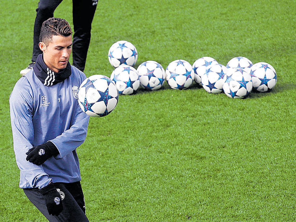 star impact: Real Madrid's Cristiano Ronaldo during a training session on Tuesday. REUTERS