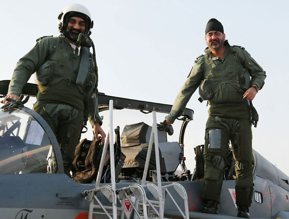 Chief of Air Staff Air Chief Marshal Birender Singh Dhanoa (right) gets ready to take off in a Tejas aircraft