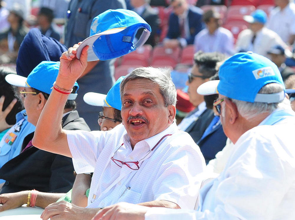 Defence Minister Manohar Parrikar at the inauguration of the 11th  edition of Aero India at Yelhanka Air Force Station in Bengaluru on Tuesday. DH photo