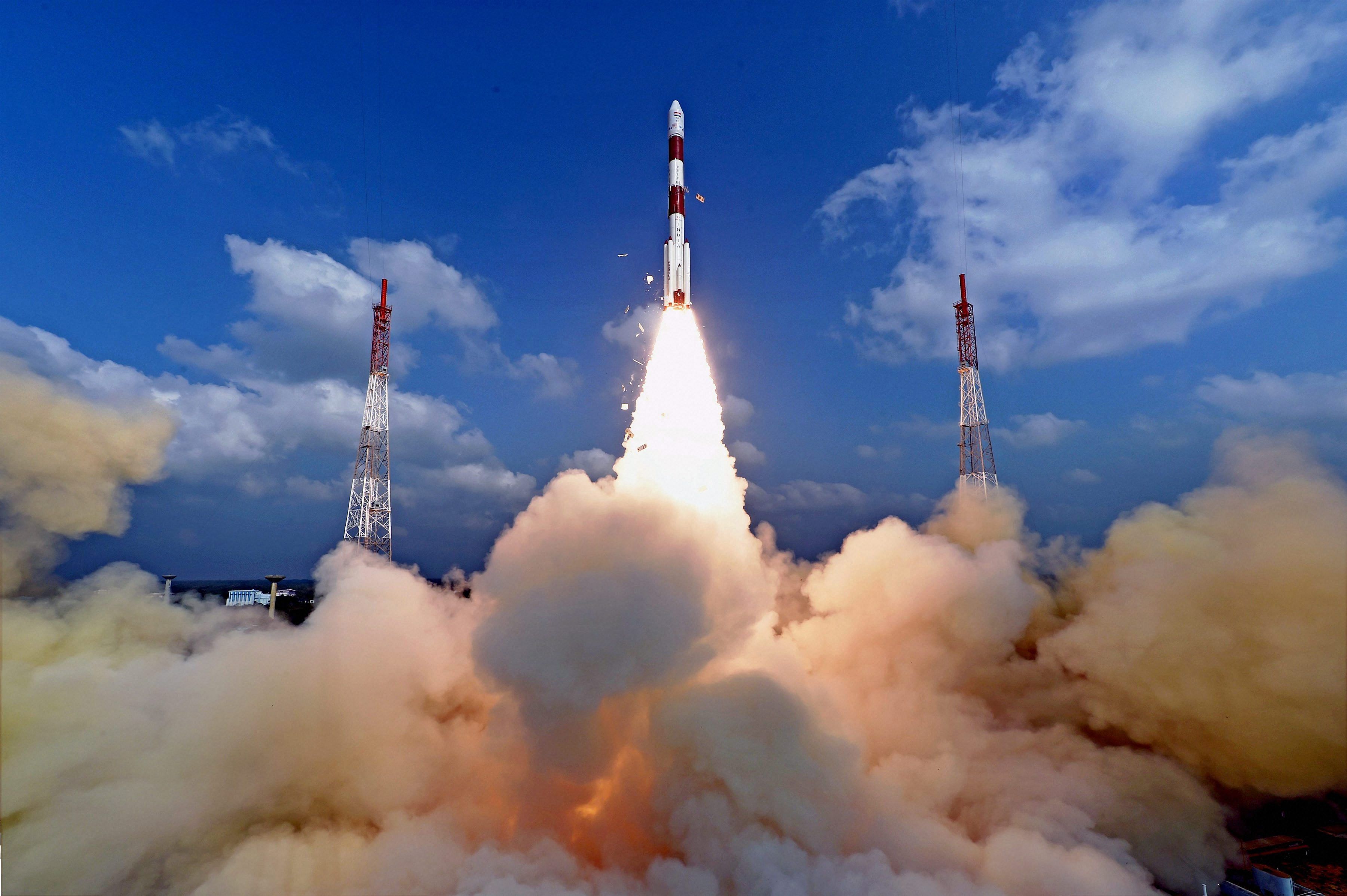 Space agency Indian Space Research Organisation (ISRO) successfully launch a record 104 satellites, including India's earth observation satellite on-board PSLV-C37/Cartosat2 Series from the spaceport of Sriharikota on Wednesday. PTI Photo.