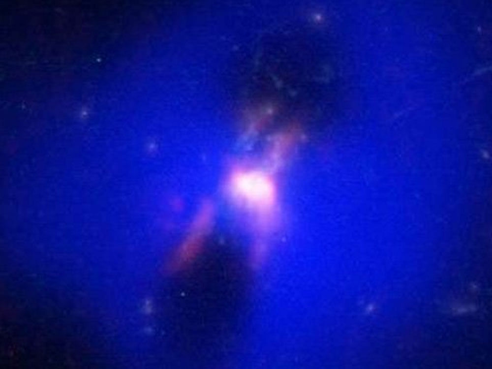 Researchers from from Massachusetts Institute of Technology (MIT) in the US and the University of Cambridge in the UK observed jets of hot, 10-million-degree gas blasting out from the central galaxy's black hole and blowing large bubbles out into the surrounding plasma. Image courtesy Twitter.