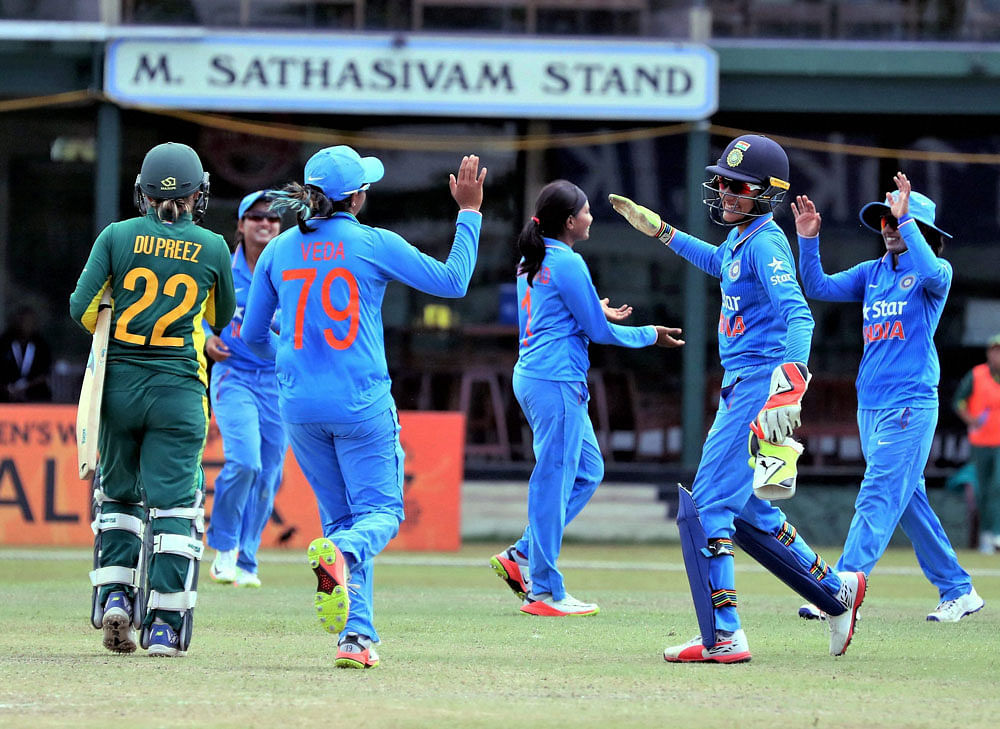 Indian team members celebrate the dismissal of South Africa during their ICC Women's World Cup Qualifier one day international cricket match in Colombo, Sri Lanka on Wednesday.India Women won by 49 runs. PTI Photo