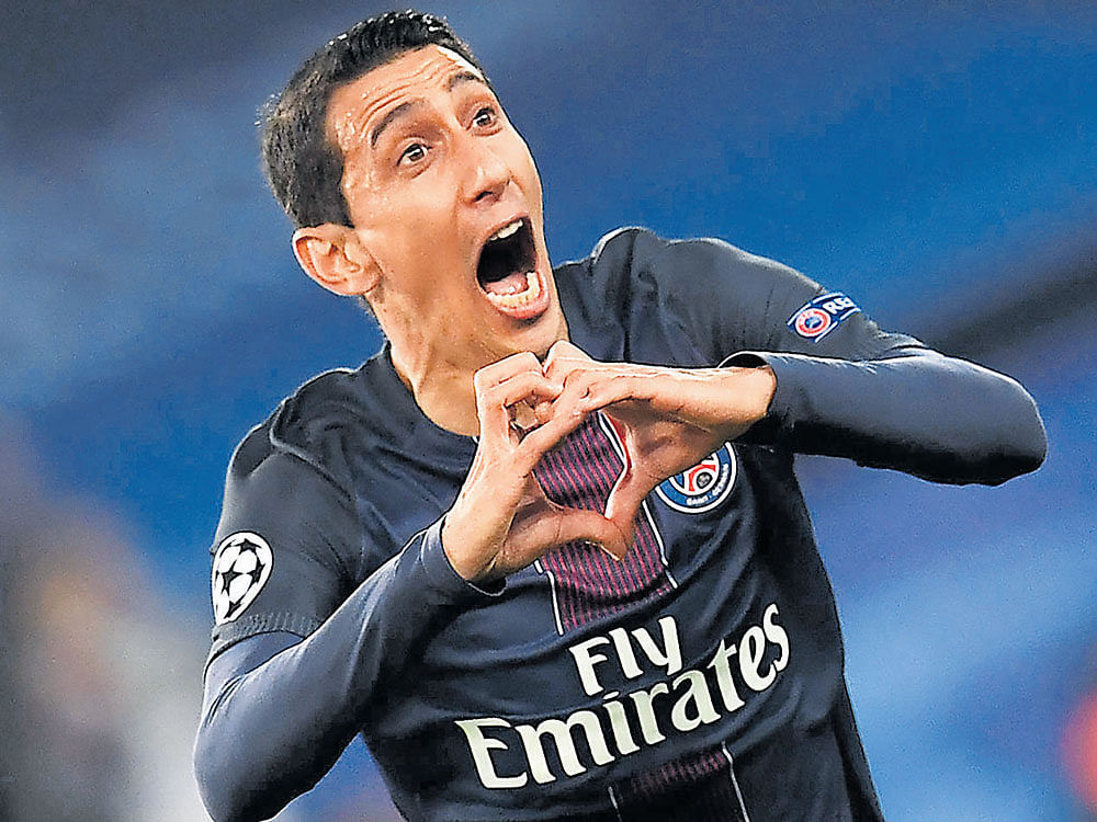 game changer: PSG's Angel Di Maria celebrates after scoring against Barcelona in the Champions League last-16 tie. AFP