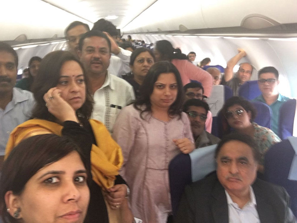 Passengers stranded in one of the planes at Kempegowda  International airport on Wednesday.