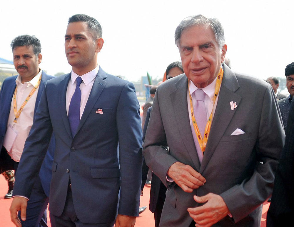 Indian Cricketer,Mahendra Singh Dhoni with Tata Group chairman,Ratan Tata,arriving for Hotwar in Ranchi on Thursday. PTI Photo