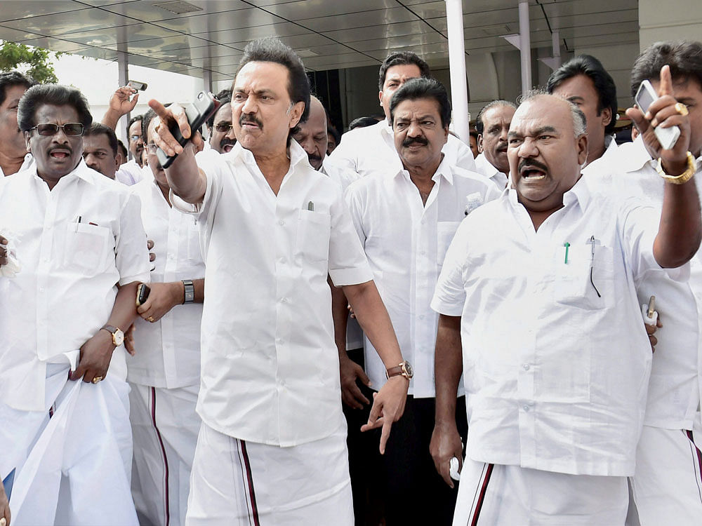 DMK working president M K Stalin arrives along with his party MLAs at the Tamil Nadu Secretariat in Chennai on Saturday. PTI Photo