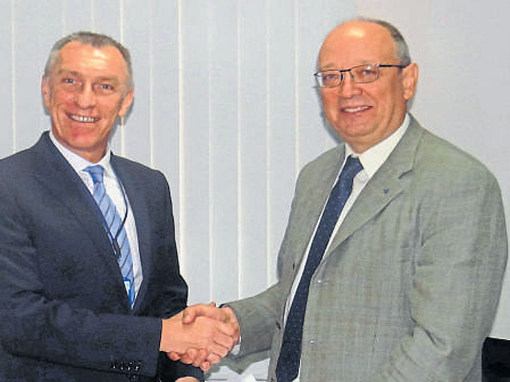 Prof Paul Croney and  Thomas Fuhrmann ink pact in Bengaluru.