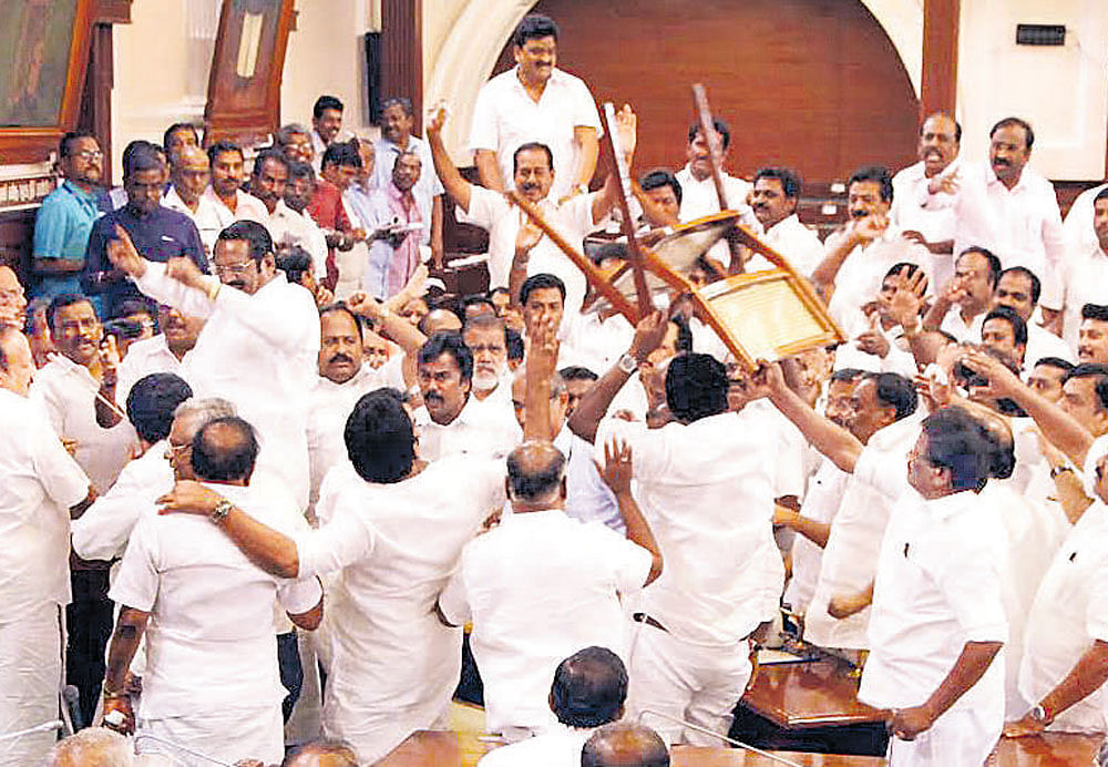 Opposition MLAs create a ruckus demanding Speaker P Dhanapal order a secret ballot in the Tamil Nadu Legislative Assembly in Chennai on Saturday.