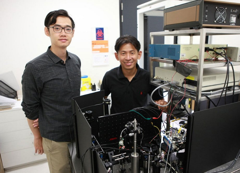 Dr. Steve Lee from Australian National University (ANU) along with barcode scanner microscope. Credit: Twitter/ ANU CECS