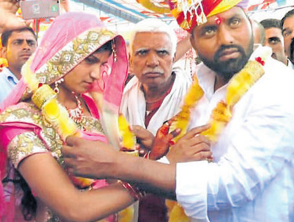Devraj Gujjar with his bride Mamta Gujjar