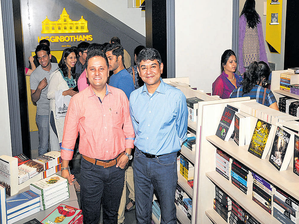 all new Amish Tripathi, author of 'Scion Of Ikshvaku' (left), at Higginbothams, the landmark bookstore on MG Road, which reopened on Saturday. DH PHOTO