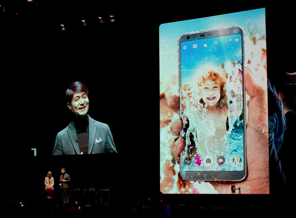 LG President Juno Cho unveils their new G6 phone ahead of Monday's opening of the Mobile World Congress wireless show in Barcelona, Spain, Sunday, Feb. 26, 2017. South Korean electronics company LG has launched the world's first smartphone with a 18:9 aspect ratio at the Mobile World Congress (MWC) technology show in Barcelona.The Mobile World Congress will be held 27 Feb. to 2 March. AP/PTI