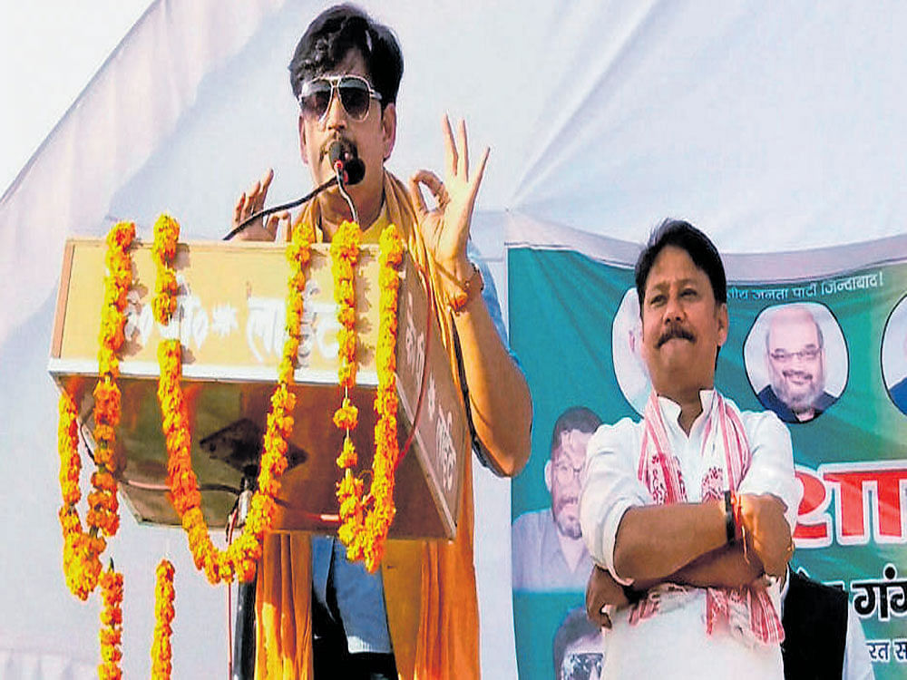 Bhojpuri actor Ravi Kishan, who recently joined the BJP,  addresses an election rally in Mirzapur on Sunday. PTI photo