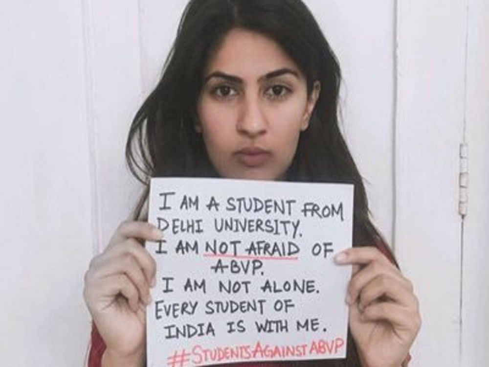 After the clashes between members of BJP-affiliated Akhil Bharatiya Vidyarthi Parishad and left-leaning All India Students Association (AISA) on Delhi University's north campus last week, Gurmehar changed her Facebook profile picture with a new one showing her holding a placard that read: 'I am a student from Delhi University. I am not afraid of ABVP. I am not alone. Every student of India is with me. #StudentsAgainstABVP.'