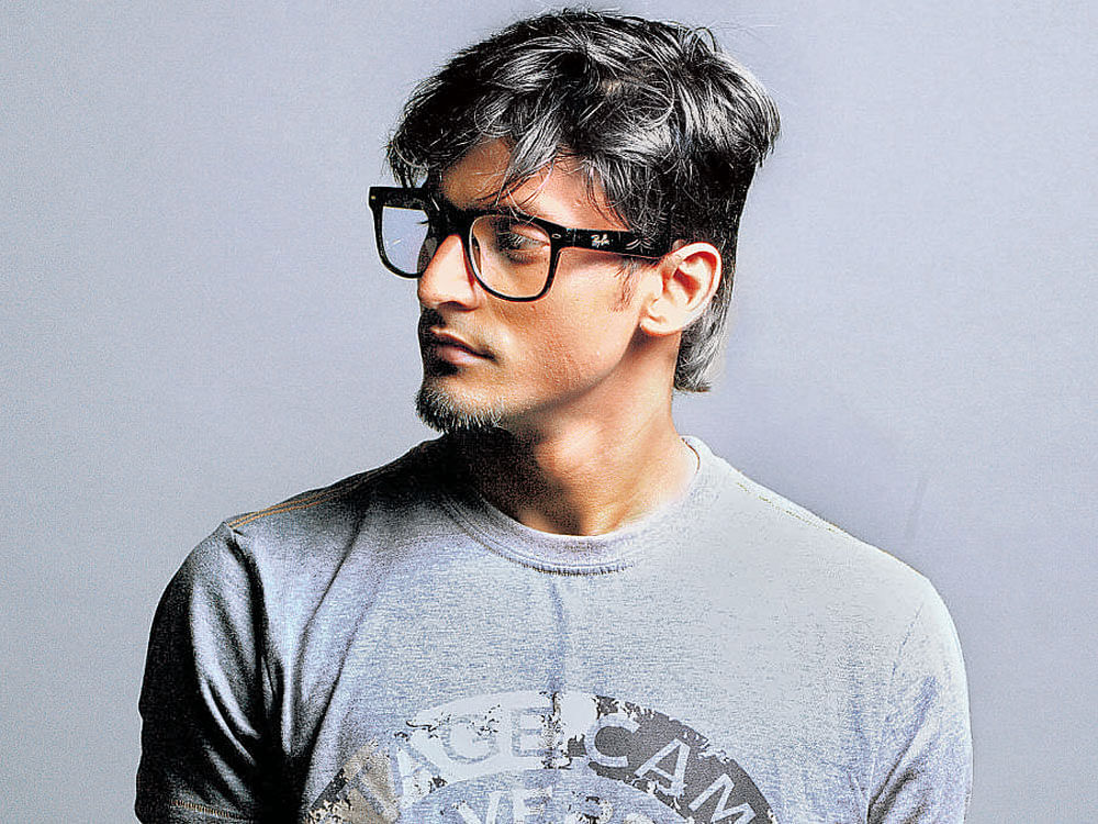 cool looks Oversized and geeky spectacles are in vogue now. (Above) Aviraj Satyam
