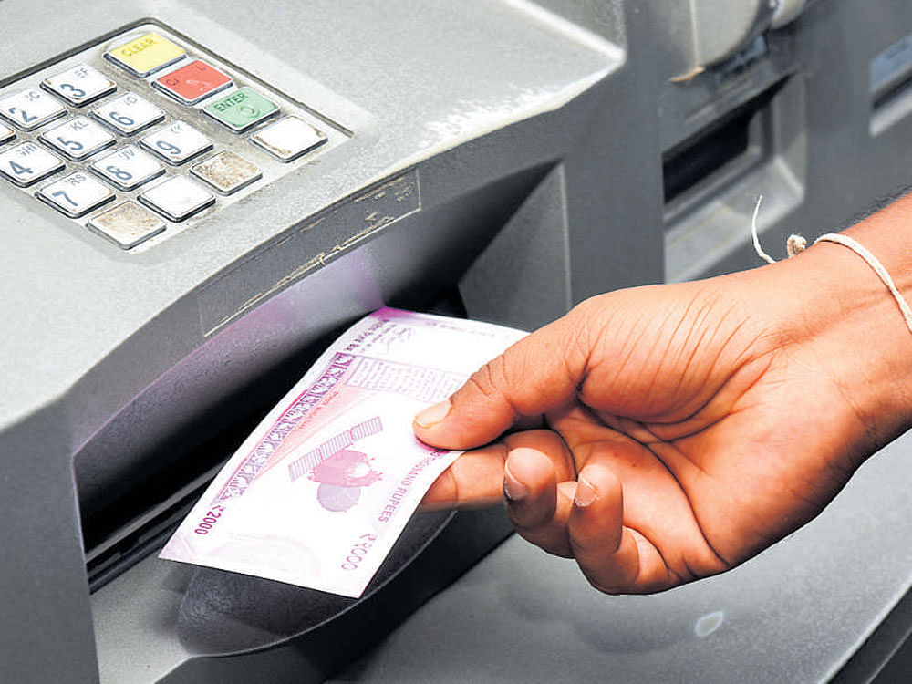 Banks including HDFC Bank, ICICI Bank and Axis Bank today began charging a minimum amount of Rs 150 per transaction for cash deposits and withdrawals beyond four free transactions in a month. File photo
