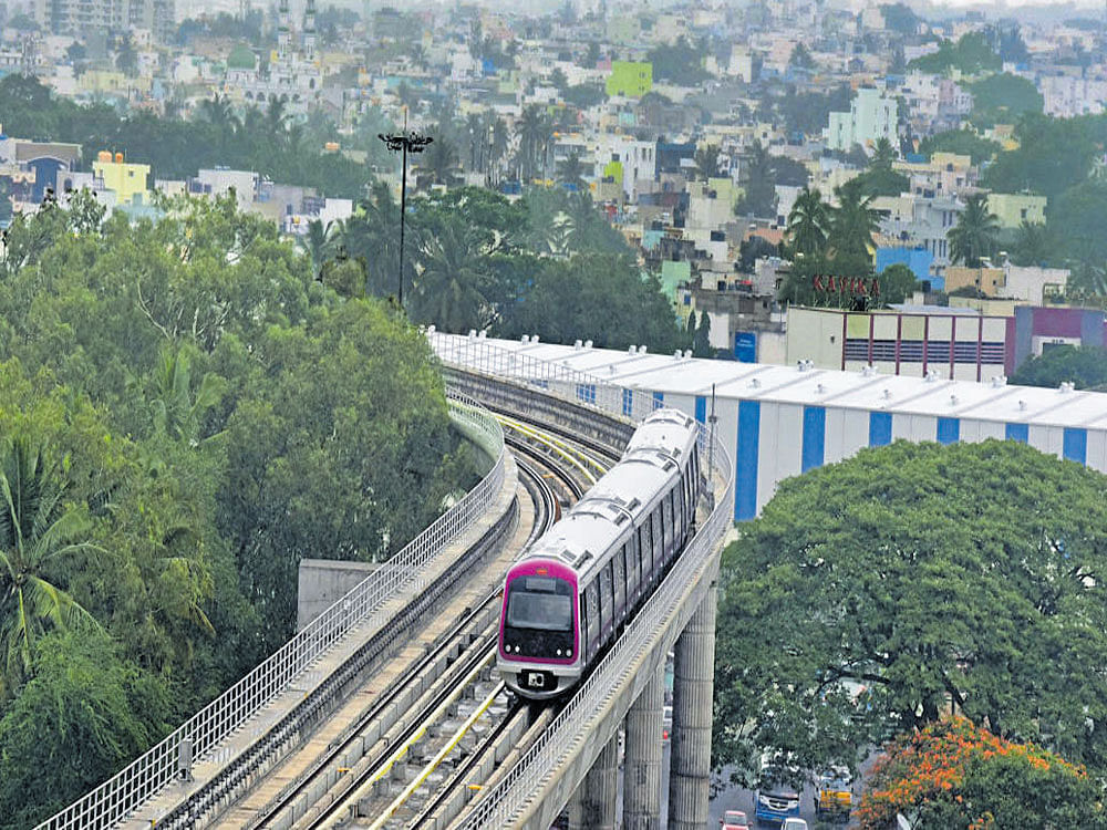 BMRCL is planning to mobilise resources for Metro Phase II project by selling land allotted for Phase I project near Metro stations. The land for Metro project was acquired and allotted by KIADB. But according to the Karnataka Industrial Policy 2014-19, BMRCL cannot sell the land. Hence, the Cabinet decided to amend the policy. DH file photo