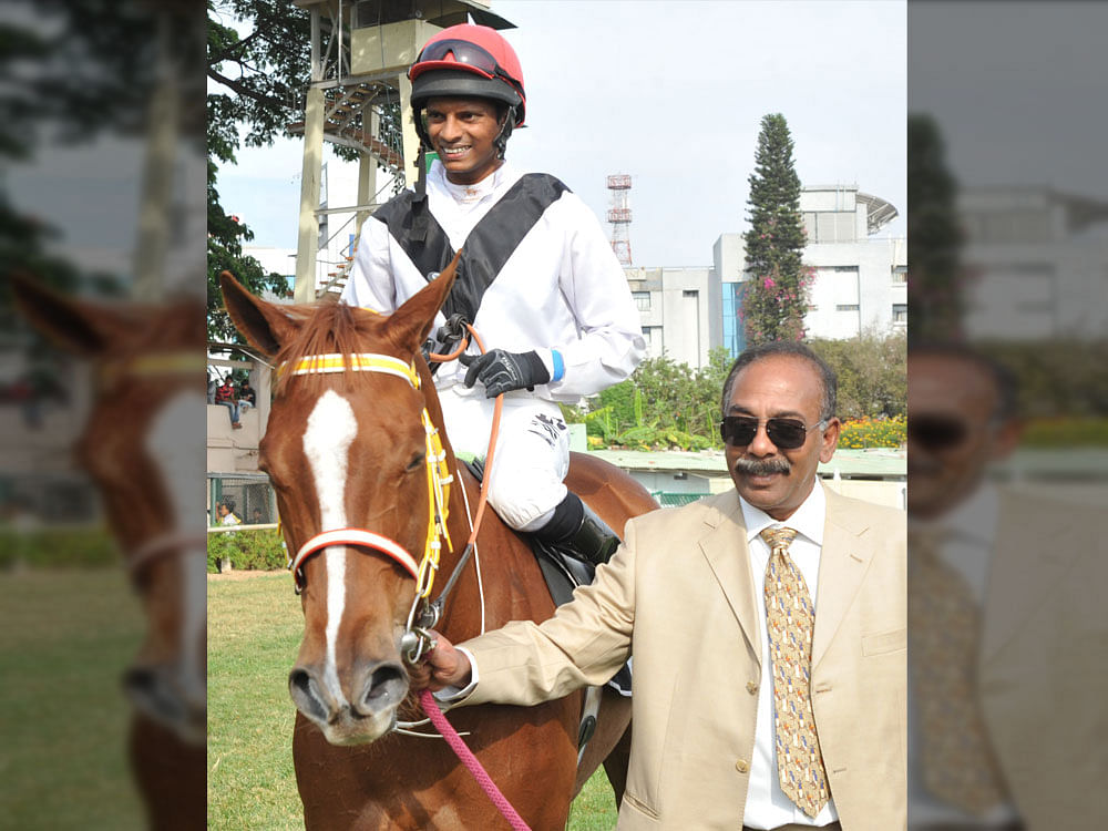 Top gun: Trainer S Padmanabhan leading in The Sunafter, (A Sandesh astride) after one of his derby wins. DH FILE Photo