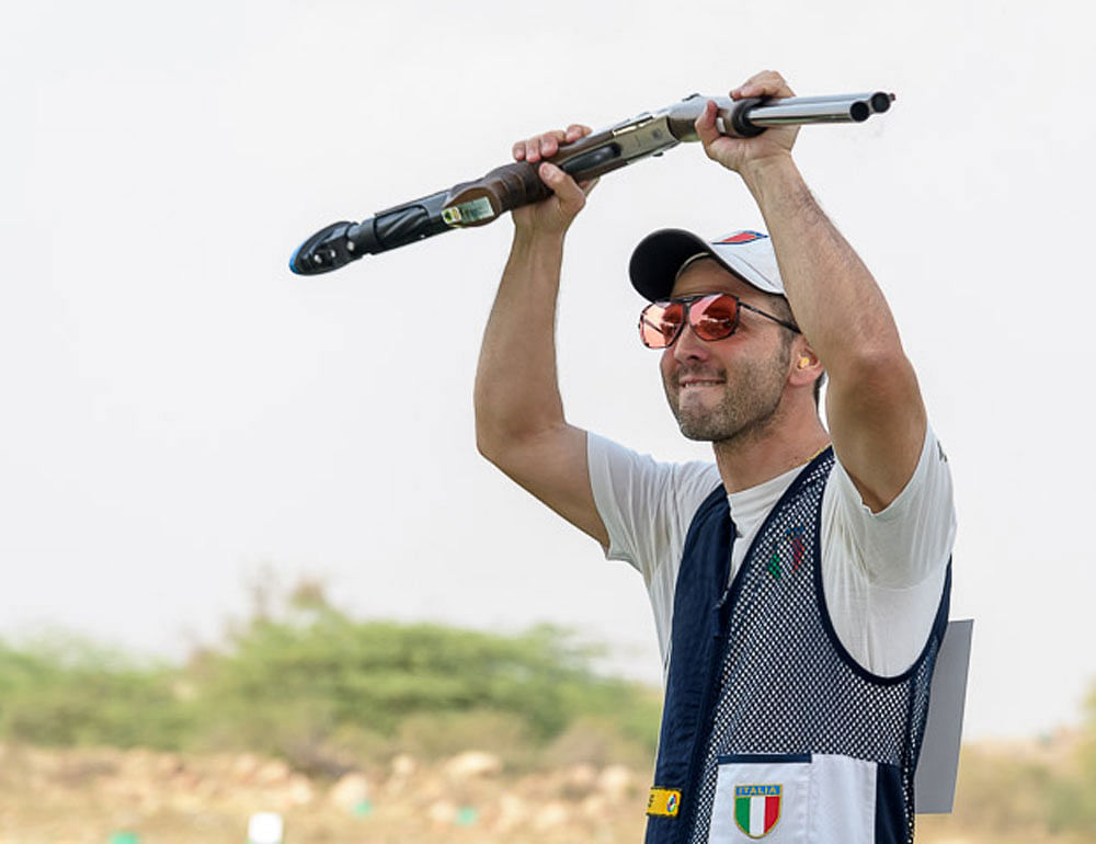 All Smiles: Italy's Riccardo Filippelli celebrates after clinching gold in the skeet final on Thursday.