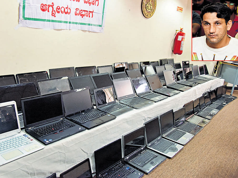 The laptops reportedly stolen by Sumeer Sharma (inset). DH&#8200;photo