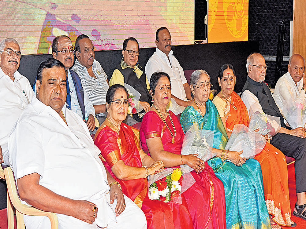 (Back row from left) N S Ramanna (Shankarnag award), J K Srinivasamurthy (R Nagendra Rao award), Dr B L Venu (Hunasuru Krishnamuthy award), M S Umesh (T N Balakrishna award), Ram Shetty (K S Taylor award). (Front row from left) N Doddanna (Thoogudeepa Srinivas award), B K Sumitra (G V Iyer award), B V Radha (Pandari Bai award), Adavani Lakshmidevi (M V Rajamma award), Devi (M P Shankar award), Pal S Chandani (N Veeraswamy award), and Kumar Shettar (B Jayamma award) at the film awards function organised by Karnataka Chalanachitra Academy in the city on Friday. DH photo