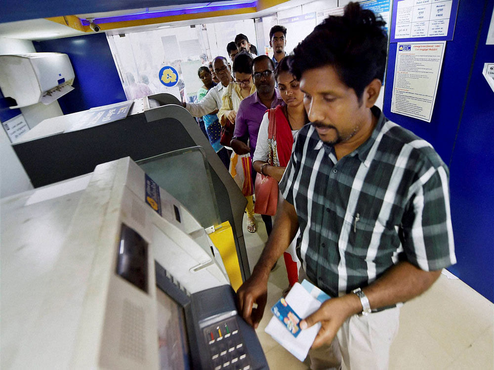 The country's largest public sector lender, State Bank of India, said that it has already levied Rs 50 beyond three transactions, and will renew the same from April 1. The Oriental Bank of Commerce, however, resorted to the practice from March 1. PTI file photo