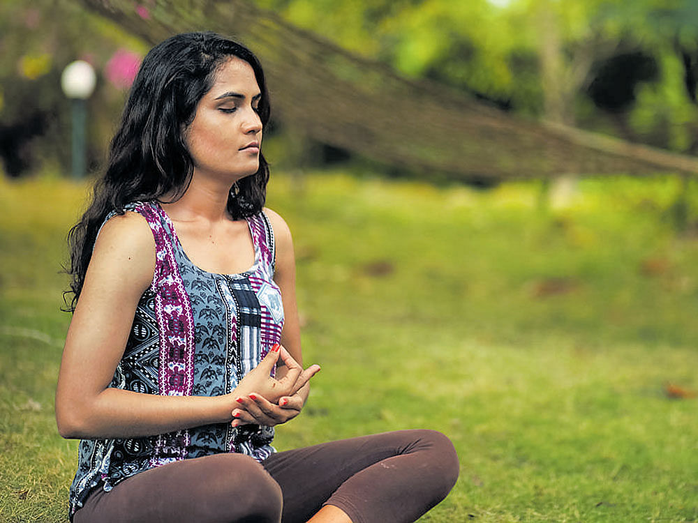 Participating in yoga and deep breathing classes twice a week along with home practice may effectively reduce the symptoms of depression. FIle photo